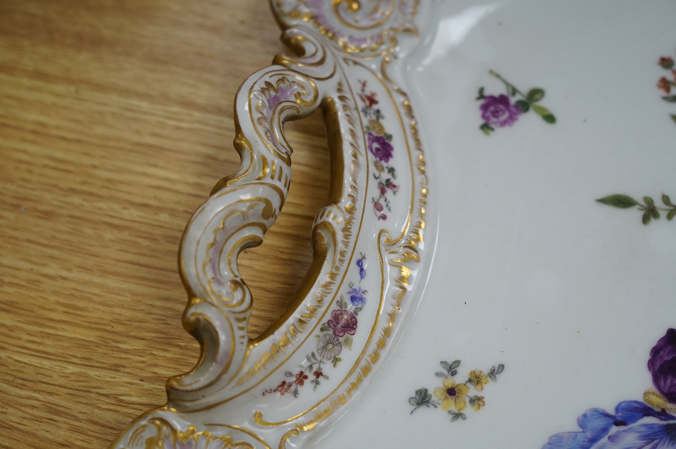 A large 19th century Dresden porcelain two handled tray, painted with a floral bouquet, 52cm. Condition - good